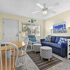 Beachy Madeira Getaway | Tropic Breeze Unit 18 – Steps to Beach, Pool Access