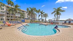 Waterfront Luxury 9-520 – Sunsets, Beach, Pool, Boat & Dolphin Views - Image 3